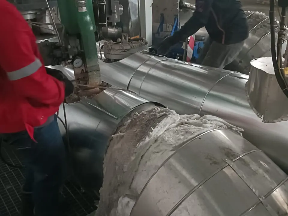 Insulating large-bore piping before cladding