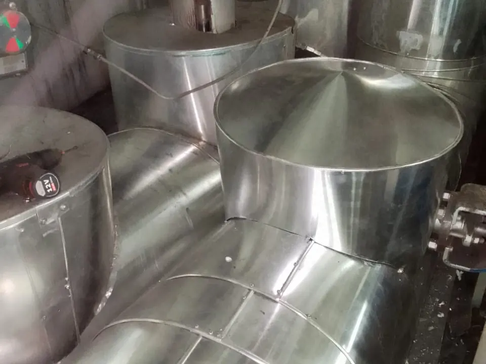 Finished cladding on a pipe tee